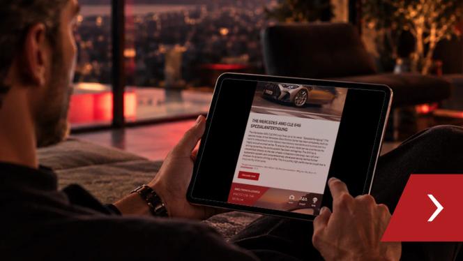 A tablet displaying the AMG PL newsletter