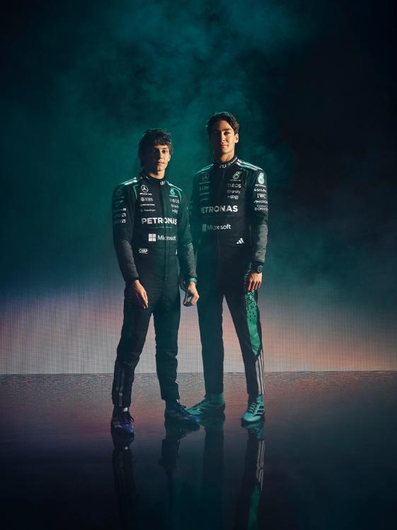 Kimi Antonelli and George Russell in race kit.