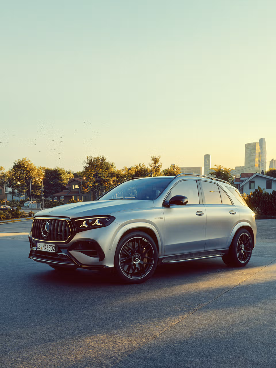 A Mercedes-AMG GLE SUV with a city in the background