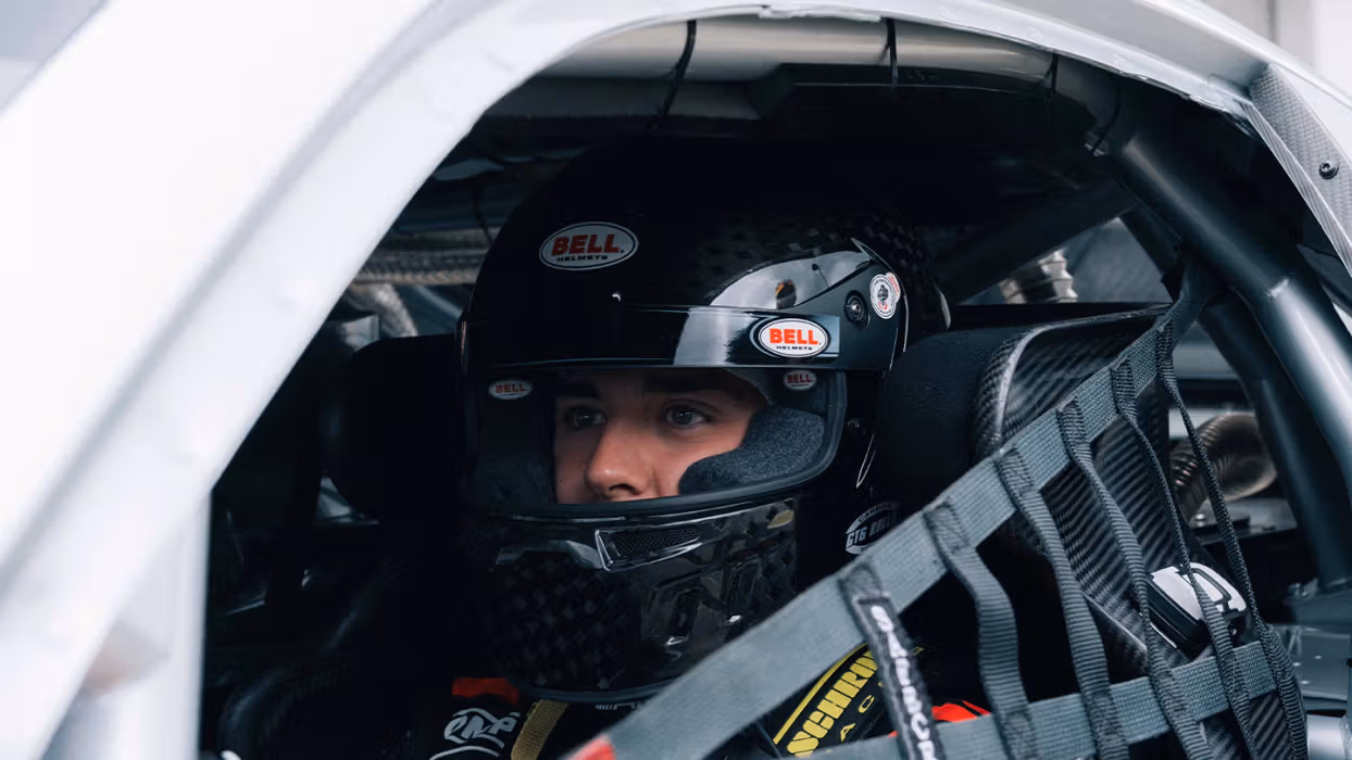 Close-up of a Mercedes-AMG racing driver.