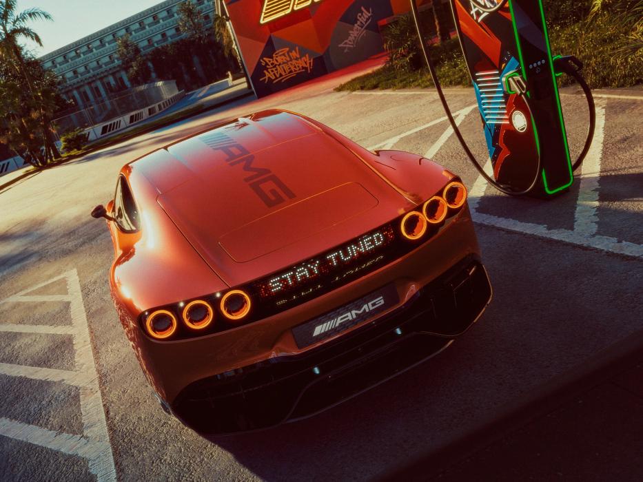 Rear view of the Concept AMG GT XX at an electric charging station