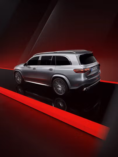 Side-rear view of the new Mercedes-AMG GLS 63 SUV in silver colour.
