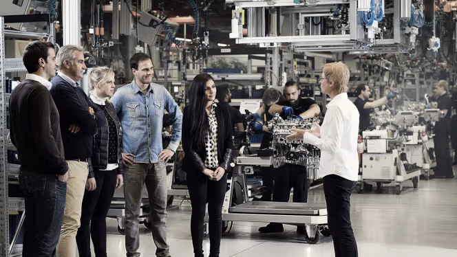 People during the AMG factory tour