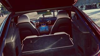 View of the interior of the Mercedes-AMG GT Coupé from the open boot