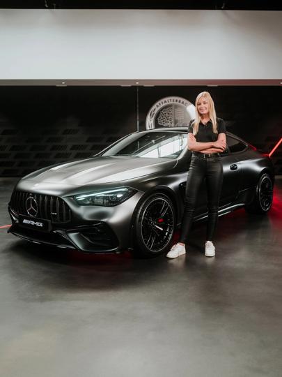 Product manager Sabrine in front of the Mercedes-AMG CLE 53 Coupe