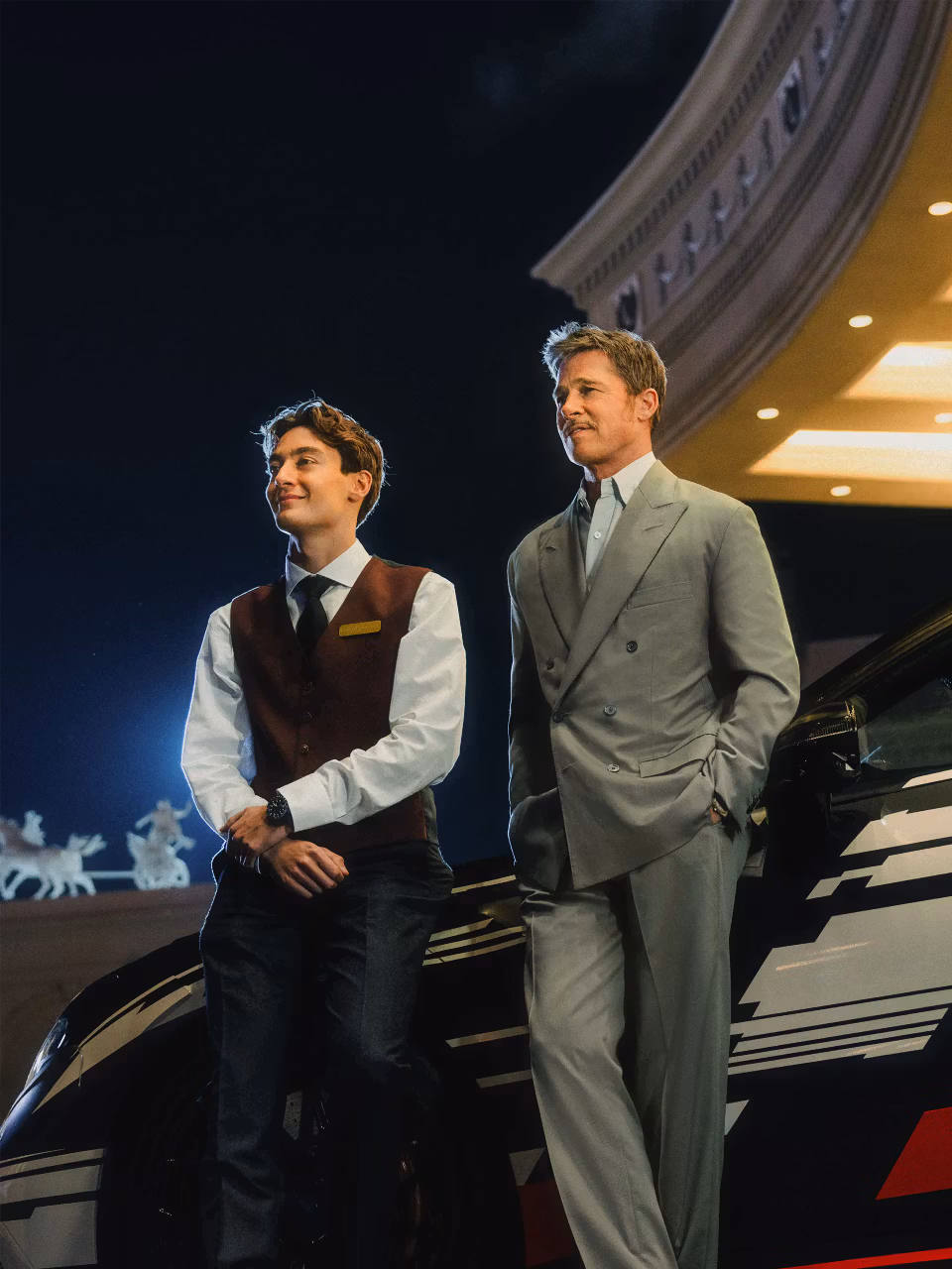 Brad Pitt und George Russle vor dem neuen Mercedes-AMG GT 4-Türer Coupé Prototyp.