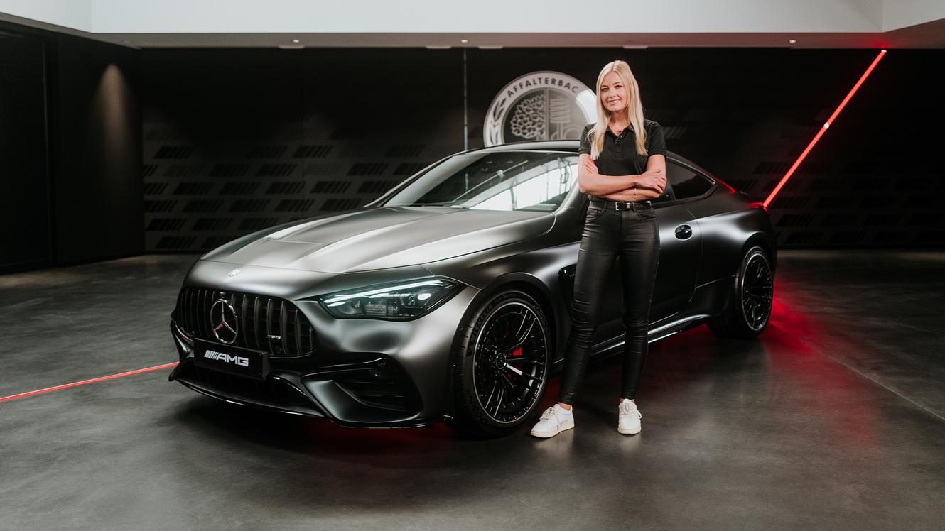 Product manager Sabrine in front of the Mercedes-AMG CLE 53 Coupe