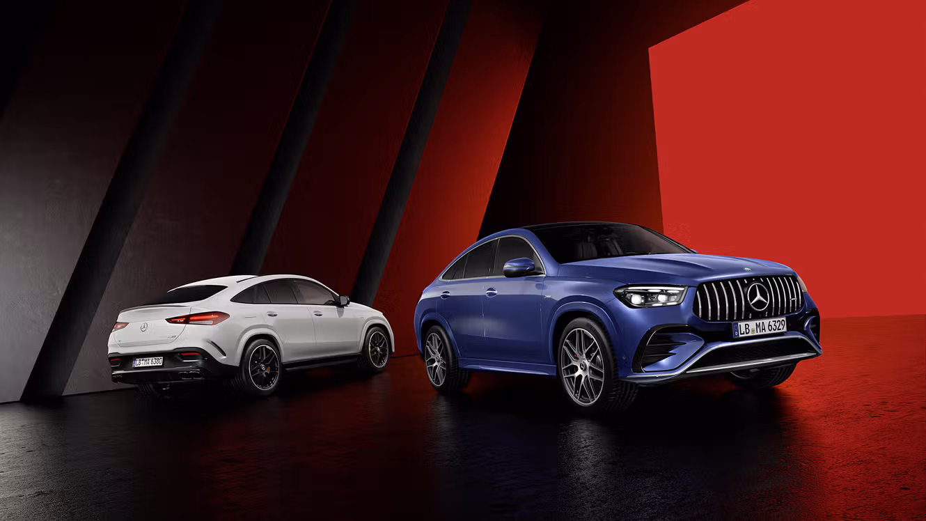 Front and rear view of two Mercedes-AMG GLE 4MATIC+ Coupés.